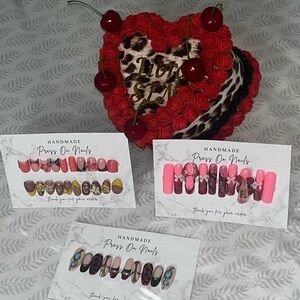 Handmade Nail Set with Red and Pink Designs